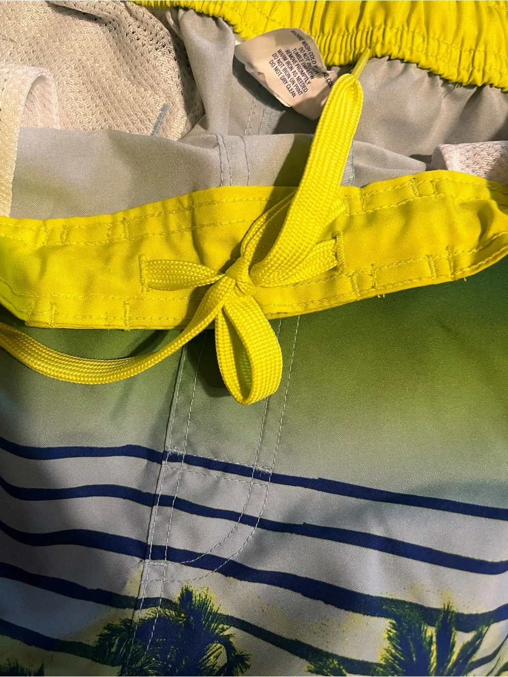 Size 18/20 boys swim shirts and swim trunks